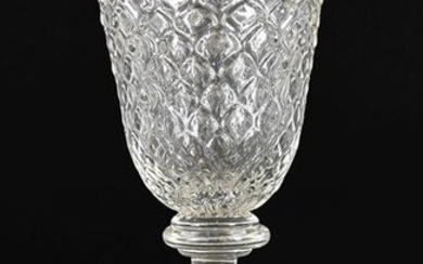 A Glass Goblet, circa 1730, the rounded funnel bowl moulded...