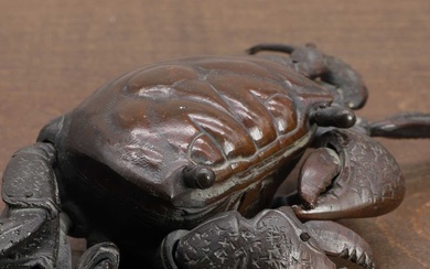 A Japanese bronze jizai okimono