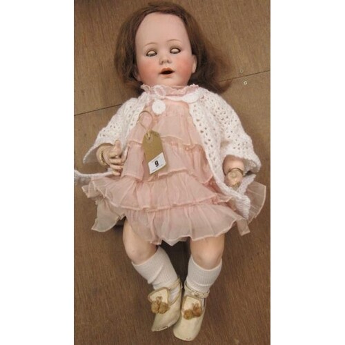 A Jutta bisque socket head crying doll, with blue glass slee...