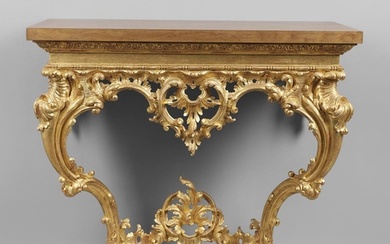 A LOUIS XVI STYLE GILTWOOD CONSOLE TABLE. the solid wood top...