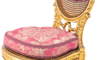 A Louis XVI-Style Carved Gilt Wood and Caned Chair