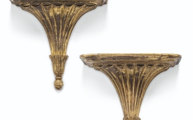 A MATCHED PAIR OF ENGLISH GILTWOOD FLUTED WALL-BRACKETS
