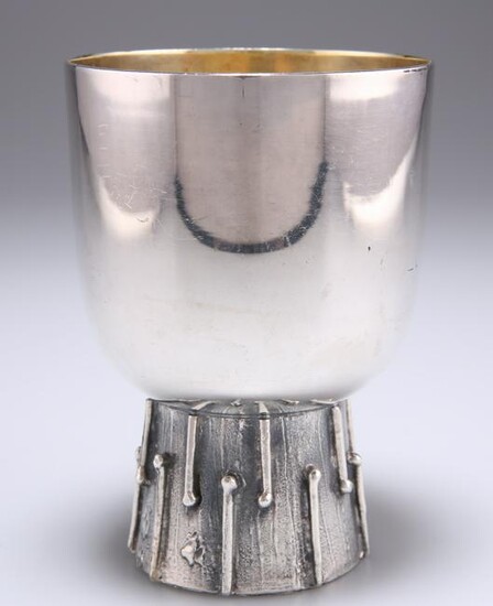 A MODERNIST SILVER-PLATED GOBLET, the rounded bowl with