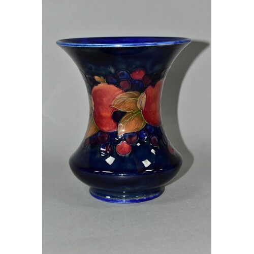 A MOORCROFT POTTERY WAISTED BALUSTER VASE, the exterior deco...
