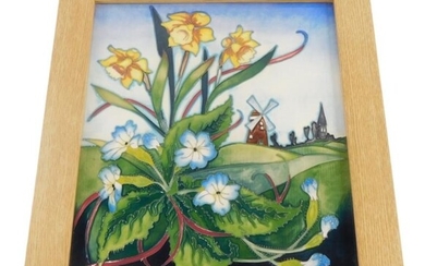 A Moorcroft pottery plaque, decorated with daffodils and blue...
