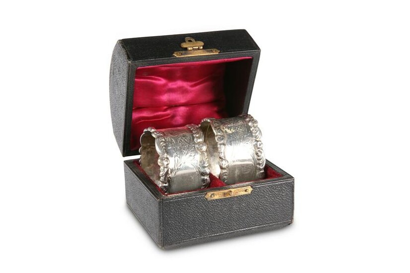 A PAIR OF EDWARDIAN SILVER NAPKIN RINGS, by Williams