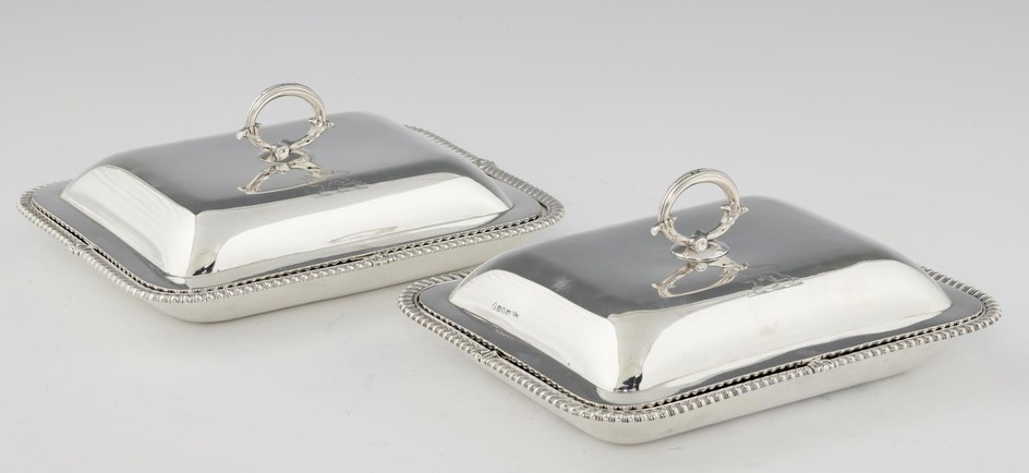 A PAIR OF GEORGE III GADROONED SILVER ENTREE DISHES AND COVE...