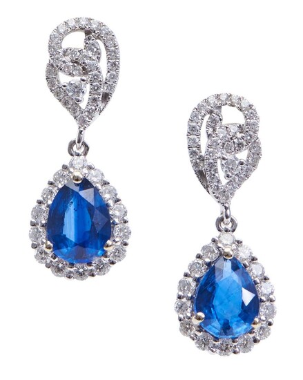 A PAIR OF KYANITE AND DIAMOND EARRINGS-Each earring comprising a pear cut kyanite weighing 1.25cts, within a border of round brillia...