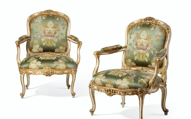 A PAIR OF LOUIS XV WHITE-PAINTED AND PARCEL-GILT FAUTEUILS, CIRCA 1760, POSSIBLY GERMAN OR AUSTRIAN