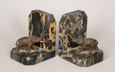A PAIR OF MARBLE AND BRONZE BOOKENDS DECORATED WITH ELEPHANTS