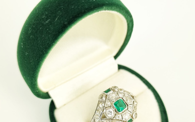 A PLATINUM HANDCRAFTED BELLE EPOQUE STYLE EMERALD AND DIAMOND RING
