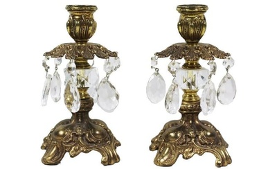 A Pair of Hollywood Regency Gold Tone Candlestick Holders