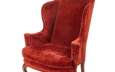 A Queen Anne carved walnut wing frame armchair, with later e...