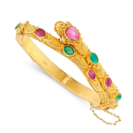 A RUBY AND EMERALD CHINESE DRAGON BANGLE in 22ct yellow