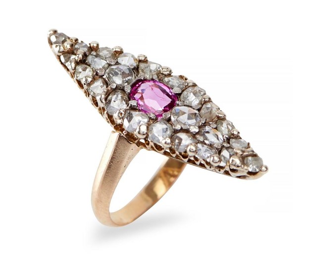 A SAPPHIRE AND DIAMOND RING - The kite shaped plaque centred with a cushion cut pink sapphire, within a surround of old European and...