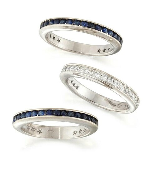 A SAPPHIRE AND DIAMOND TRIPLE HALF HOOP RING, formed of