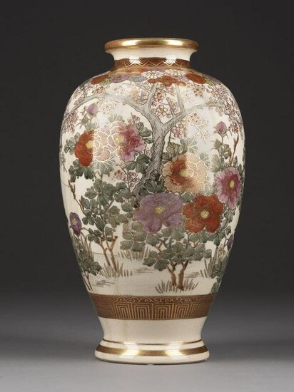 A SATSUMA VASE WITH FLOWER PATTERNS