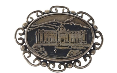 A SILVER ARCHITECTURAL BROOCH
