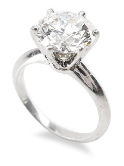 A SOLITAIRE DIAMOND RING BY TIFFANY & CO