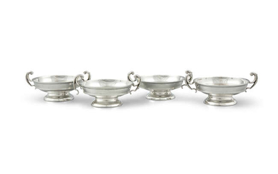 A SUITE OF FOUR SILVER SHALLOW URN SHAPED...