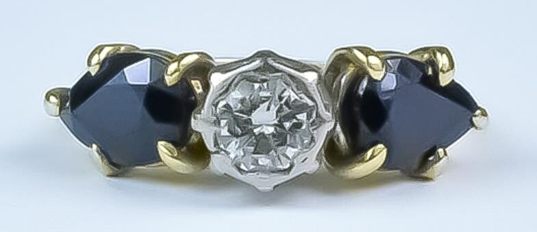 A Sapphire and Diamond Ring, 20th Century, yellow metal...