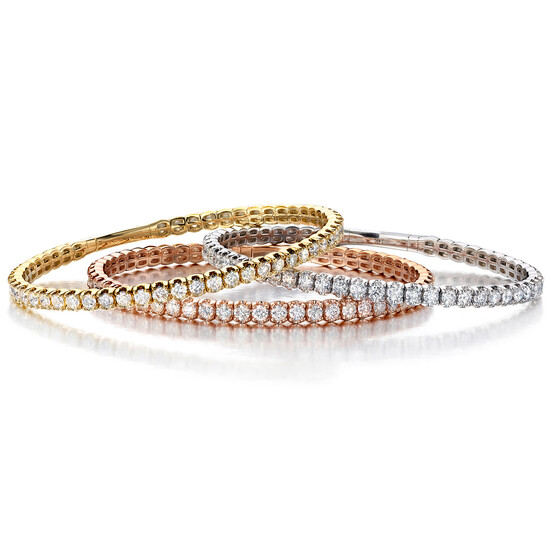A Set of Three Diamond and Tri-Colored Gold Bracelets