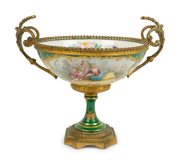 A Sevres Style Gilt Bronze Mounted Porcelain Footed