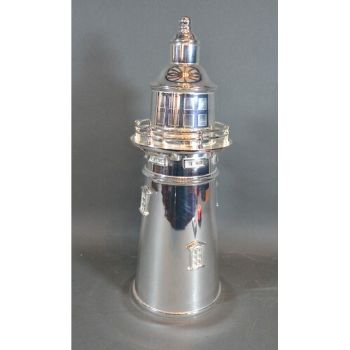 A Silver Plated Cocktail Shaker in the form of a Lighthouse,...