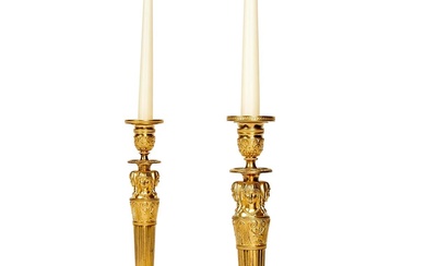 A VERY NEAR PAIR OF FRENCH GILT AND PATINATED BRONZE CANDLESTICKS AFTER GALLE AND PERCIER