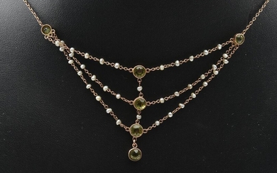 A VICTORIAN PERIDOT AND NATURAL SEED PEARL NECKLACE IN 9CT GOLD, 3.7GMS