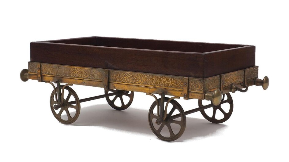A Victorian novelty wine coaster, modelled as a mahogany and brass mounted carriage, 38cm long Provenance: Lot 180 from Christie's Interiors sale, July 2012