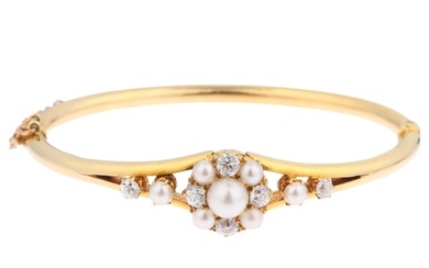 A Victorian pearl and diamond cluster hinged bangle, unmarke...