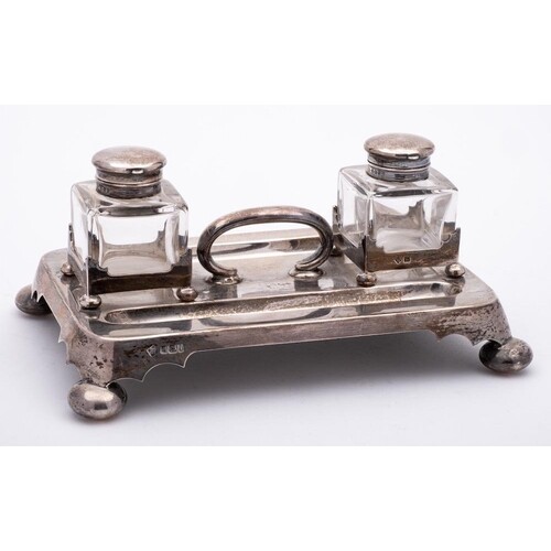 A Victorian silver inkwell desk stand, maker Martin, Hall & ...