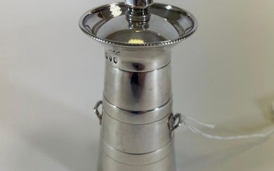 A Victorian sterling silver butter churn shaped pepper grinder. Approximate...