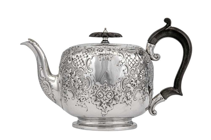 A Victorian sterling silver teapot, London 1897 by Goldsmiths & Silversmiths Co