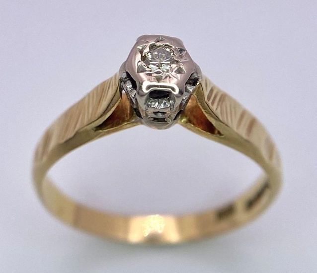 A Vintage 18K Yellow Gold Diamond Solitaire Ring....
