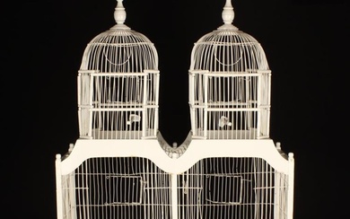 A Vintage White Painted Wire & Wood Twin-domed Bird Cage 34'' (86 cm) high, 27½'' x 9½'' (70 cm x 23