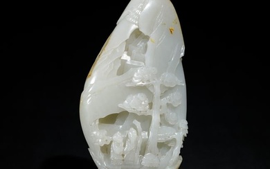 A WELL-CARVED WHITE JADE BOULDER
