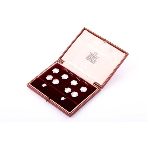 A beautifully presented Garrard and Co suite of cufflinks an...