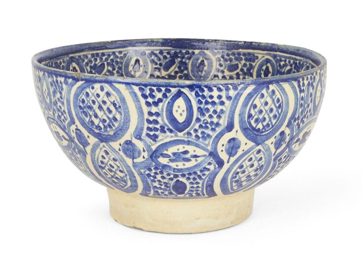 A blue and white pottery bowl, North African, 20th century, 25cm diam. x 14cm high