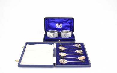 A cased set of six silver teaspoons with coffee bean...