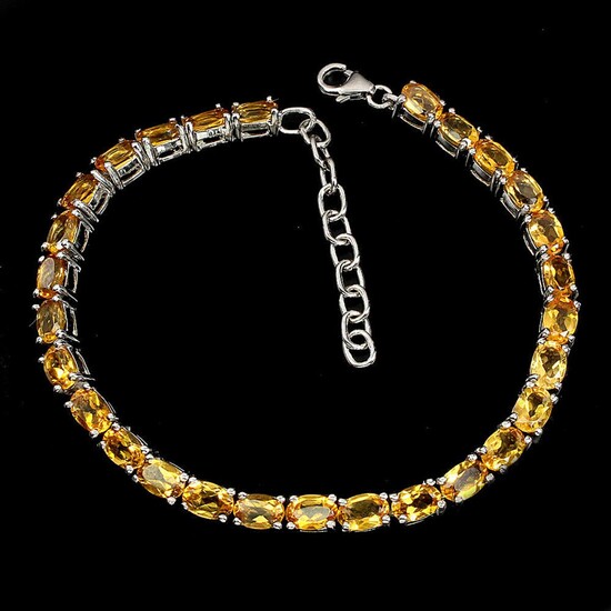 NOT SOLD. A citrine bracelet set with numerous oval-cut citrines, mounted in rhodium plated sterling silver. Adjustable length 17-20 cm. – Bruun Rasmussen Auctioneers of Fine Art