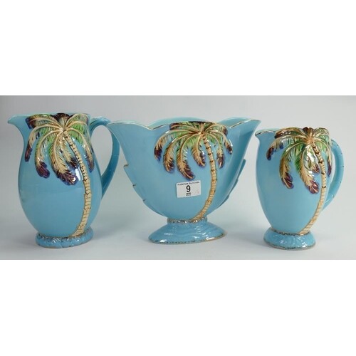 A collection of Beswick light blue Palm vases: and Jugs (3)
