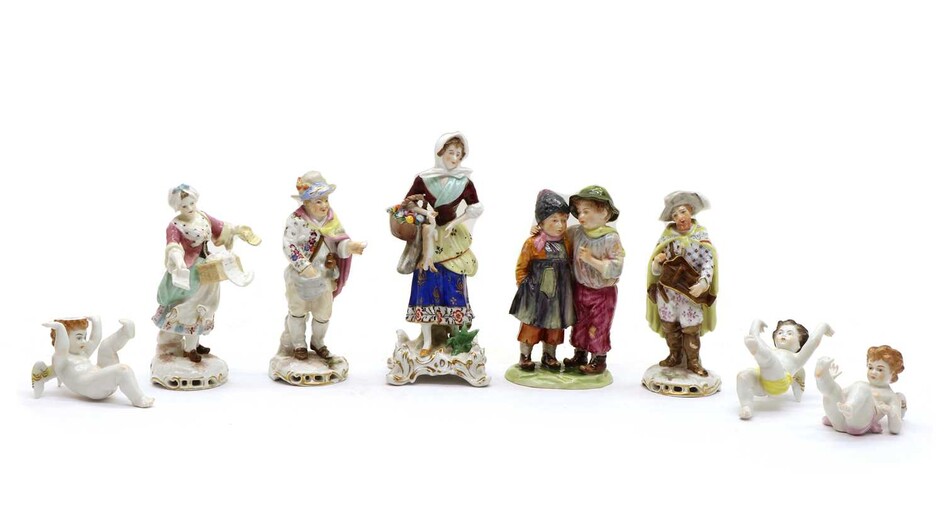 A collection of Continental porcelain figures
