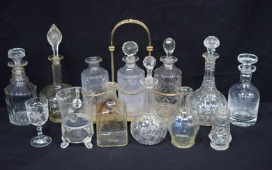 A collection of decanters and other glass articles