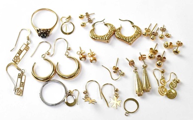 A collection of gold and yellow metal items comprising a...