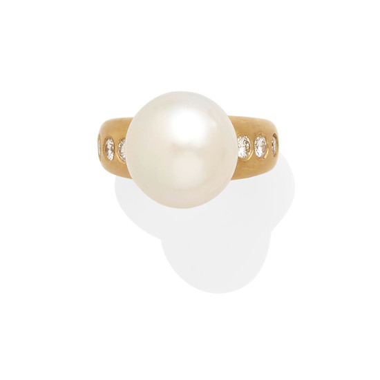 A cultured pearl and diamond ring