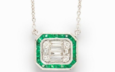A diamond, emerald and eighteen karat white gold