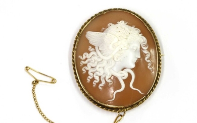 A gold mounted shell cameo brooch