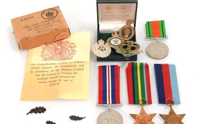 A group of Second World War medals in a box...